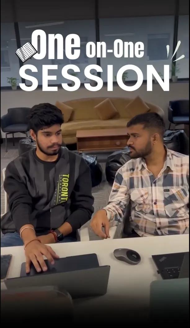 A mentor explaining a campaign to one student at the centre