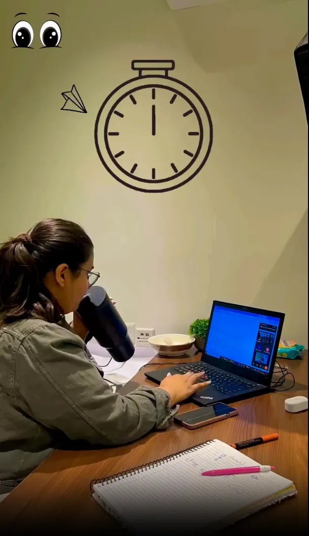 A student working on her laptop at the centre